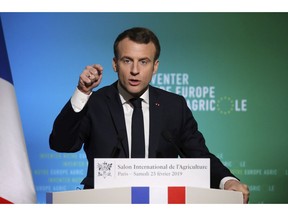 French President Emmanuel Macron delivers a speech at the opening of the International Agriculture Fair in Paris, France, Saturday, Feb. 23, 2019. Macron is visiting France's biggest premier agricultural fair amid nationwide anger at government policies seen as favoring urban elites and neglecting the heartland.