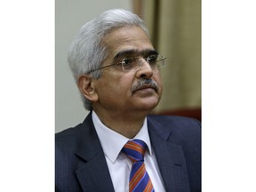 Governor of Reserve Bank of India Shaktikanta Das addresses a press conference in Mumbai, India, Thursday, Feb. 7, 2019.  India's central bank has lowered its key interest rate by a quarter of a percentage point to 6.25 percent, a step that is expected to boost the economy.