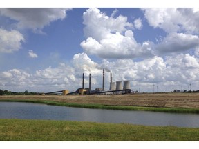 FILE - This June 3, 2014, file photo shows a panoramic view of the Paradise Fossil Plant in Drakesboro Ky. President Donald Trump's vow to save the coal industry will be tested this week when a utility board he appoints weighs whether to close a coal-fired power plant in Kentucky whose suppliers include a mine owned by one of his campaign donors. An environmental assessment by the Tennessee Valley Authority recommends shuttering the remaining coal-fired unit at the Paradise Fossil Plant in Muhlenberg County. The board could vote on Thursday, Feb. 14, 2019.