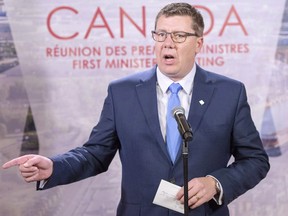 Saskatchewan Premier Scott Moe speaks at the First Ministers conference in Montreal in December. Legal experts, government officials, industry leaders -- and maybe even the public -- will watch this week as Saskatchewan and Ottawa head to court over the constitutionality of a federally-imposed carbon tax.
