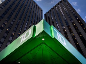 Toronto-Dominion Bank increased its dividend as it reported a 2.4 per cent uptick in first-quarter profits.