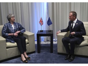 European Union Council President Donald Tusk, right, speaks with British Prime Minister Theresa May during a bilateral meeting on the sidelines of a summit of EU and Arab leaders at the Sharm El Sheikh convention center in Sharm El Sheikh, Egypt, Sunday, Feb. 24, 2019. British Prime Minister Theresa May is set to hold Brexit talks with European Council President Donald Tusk ahead of a potentially pivotal week for her plans to lead her country out of the European Union.