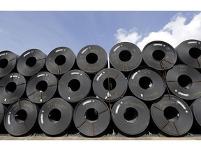 FILE - In this June 5, 2018, file photo, rolls of steel are shown in Baytown, Texas. Despite President Donald Trump's tough talk on trade, his administration has granted hundreds of companies permission to import millions of tons of steel made in China, Japan and other countries without paying the hefty tariff he put in place to protect U.S. manufacturers and jobs, according to an Associated Press analysis.