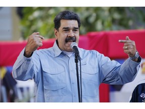 Venezuela's President Nicolas Maduro speaks during an event at Bolivar Square in Caracas, Venezuela, Thursday, Feb. 7, 2019. Maduro said that he hopes to collect 10 million signatures demanding that Washington withdraw threats of war against the people of Venezuela.