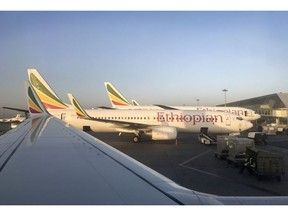 This photo taken Monday, Feb. 11, 2019 shows an Ethiopian Airlines Boeing 737-800 parked at Bole International Airport in Addis Ababa, Ethiopia. An Ethiopian Airlines Boeing 737 Max 8 jetliner carrying 157 people crashed shortly after takeoff from the Ethiopian capital Sunday, March 10, 2019 killing everyone aboard, authorities said.