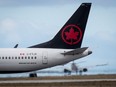 An Air Canada Boeing 737 Max 8 aircraft departing for Calgary taxis to a runway at Vancouver International Airport in Richmond, B.C., on Tuesday, March 12, 2019.