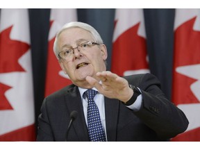 Transport Minister Marc Garneau speaks about the grounding of all Boeing 737 Max 8 airplanes in Canada during a press conference in Ottawa on Wednesday.