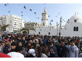 High school students march in central Algiers, Sunday, March 10, 2019. The protesters are challenging President Abdelaziz Bouteflika's fitness to run for a fifth term in next month's election.
