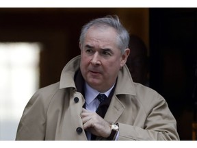 FILE  - In this Tuesday, Jan. 29, 2019 file photo, Attorney General Geoffrey Cox leaves after a cabinet meeting at Downing Street in London. Britain's chief law officer says Brexit negotiations with the European Union will continue through the weekend, as the U.K. scrambles to secure changes to the EU divorce deal before a vote in Parliament next week, it was reported on Thursday, March 7, 2019. The EU says "difficult" talks have failed to produce a breakthrough because British proposals are unrealistic.