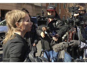 In this Tuesday, March 5, 2019 photo, Chelsea Manning addresses the media outside federal court in Alexandria, Va. The former Army intelligence analyst was ordered to jail Friday, March 8, 2019, for refusing to testify to a Virginia grand jury investigating Wikileaks.