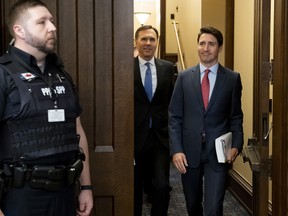 rime Minister Justin Trudeau and Minister of Finance Bill Morneau arrive in the foyer of the House of Commons to table the Budget on Parliament Hill in Ottawa on Tuesday, March 19, 2019.