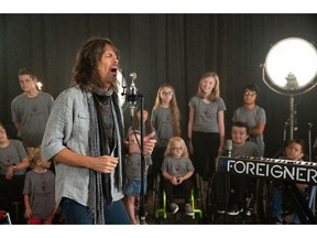 Foreigner with patients of Shriners Hospitals for Children