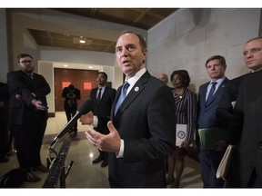 FILE - In this Thursday, Feb. 28, 2019 file photo, Rep. Adam Schiff, chairman of the House Intelligence Committee, talks to reporters after a day of interviewing Michael Cohen, President Donald Trump's former lawyer, on Capitol Hill in Washington. Democrats are undertaking several broad new investigations into President Trump and setting the stage for a post-Robert Mueller world. Schiff, said Republicans had prematurely closed the matter of Russian interference in the 2016 election without interviewing key witnesses and demanding important documents.