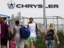 Workers arrive for their shift at the Chrysler (FCA) assembly Plant in Windsor, Ont., on June 12, 2018.
