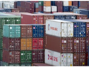 Shipping containers are seen at the Fairview Cove Container Terminal in in Halifax on August 25, 2017. Statistics Canada says the country's merchandise trade deficit narrowed to $4.2 billion in January as higher oil prices helped exports rise faster than imports. The result followed a revised deficit of $4.8 billion in December compared with an initial reading of a deficit of $4.6 billion for the final month of 2018.