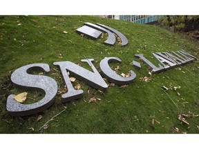 The front lawn of the headquarters of SNC Lavalin is seen Thursday, November 6, 2014 in Montreal. SNC-Lavalin Group Inc. is considering a lawsuit against Chile's state-owned copper mining company, which has terminated its contract with the construction giant. A spokesman for SNC-Lavalin tells