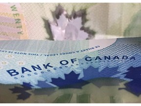 Canadian bank notes are seen Wednesday September 6, 2017 in Ottawa.THE CANADIAN PRESS/Adrian Wyld
