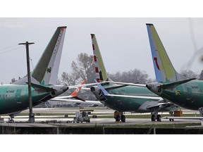 Boeing 737 MAX 8 planes are parked near Boeing Co.'s 737 assembly facility in Renton, Wash. on Nov. 14, 2018. In the wake of the Ethiopian Airlines tragedy, Canada's two largest airlines say they are confident in the safety of the Boeing aircraft that makes up part of their fleets. The accident Sunday, which killed all 157 aboard the Boeing 737 Max 8, raised concerns over parallels to the crash of a Lion Air jet that plunged into the Java Sea last October, killing 189 people.