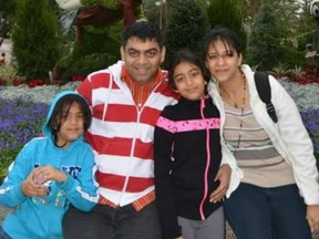 Prerit Dixit, 43, his wife Kosha, 37, their daughters Anushka, 12, and Ashka, 15.