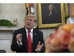 President Donald Trump speaks during a meeting with Fabiana Rosales, a Venezuelan activist who is the wife of Venezuelan opposition leader Juan Guaido, in the Oval Office of the White House in Washington, Wednesday, March 27, 2019.