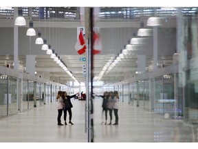 A few shoppers browse the sprawling New Horizon Mall in Calgary on Tuesday, March 19, 2019. Ten months after tenants started moving into the still mostly empty New Horizon Mall just north of Calgary, its first anchor tenant is being announced this week.That means the grand opening originally scheduled for October could take place -- at last -- this spring, says Eli Swirsky, president of The Torgan Group, which developed the Asian bazaar-style centre in conjunction with its partner, MPI Property Group.