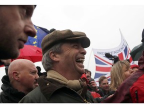 Former UKIP party leader Nigel Farage joins the start of the first leg of March to Leave the European Union, in Sunderland, England, Saturday, March 16, 2019. Hard-core Brexiteers led by former U.K. Independence Party leader Nigel Farage set out on a two-week "Leave Means Leave" march between northern England and London, accusing politicians of "betraying the will of the people."