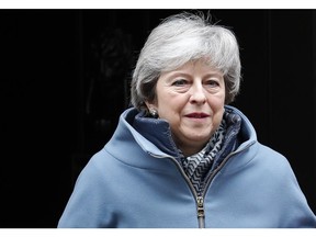 Britain's Prime Minister Theresa May leaves 10 Downing Street to attend the weekly Prime Ministers' Questions session, at parliament in London, Wednesday, March 6, 2019.