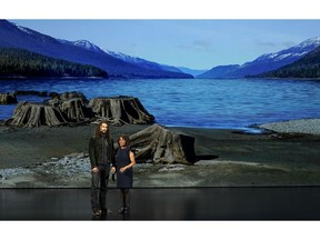 Jason Momoa, left, and Alfre Woodard speak at the Steve Jobs Theater during an event to announce Apple new products Monday, March 25, 2019, in Cupertino, Calif.