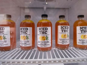 Bottles of THC fruit drink sit on a shelf in the fridge at Eden Medicinal Society, a cannabis retailer, in Toronto, Ontario, Tuesday, October 4, 2016.