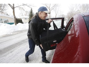 Monty Noyes, a retired photographer who is supplementing his Canadian pension income by working for the food delivery service Skip The Dishes, loads his delivery bag into his car in Winnipeg. Wednesday, March 13, 2019. Noyes is enjoying the flexibility and stress-free working environment. Seniors are increasingly deciding to keep working after retiring in part because people are living longer.