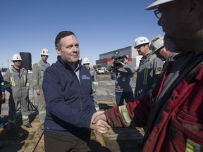 Alberta UCP leader Jason Kenney speaks with workers at Total Energy Services in Leduc Alta. on Tuesday, March 19, 2019.