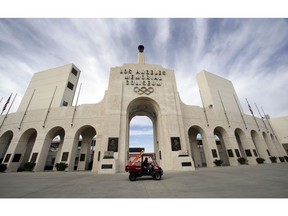 FILE - This Jan. 13, 2016 file photo shows the peristyle of the Los Angeles Memorial Coliseum in Los Angeles. The University of Southern California's sale of naming rights for Los Angeles Memorial Coliseum is being criticized as dishonoring the historic stadium's dedication as a memorial to soldiers who fought and died in World War I. USC announced last year that the stadium will be renamed United Airlines Memorial Coliseum as part of a $270 million renovation of the facility, which opened in 1923.