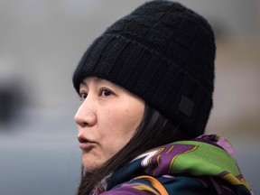 Huawei chief financial officer Meng Wanzhou arrives at a parole office in Vancouver, British Columbia, on December 12, 2018.