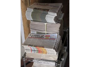 This Feb. 20, 2019 photo shows old copies of the Uranus Examiner stacked in the paper's office near St. Robert, Mo. Only five editions of the paper were printed.