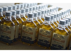 In this Thursday, Feb. 28, 2019 photo, bottles of a special edition of Stork Club rye whiskey stand in a storage room of the German whiskey maker Spreewood Distillerie in Schlepzig, Germany.