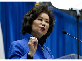 FILE - In this Dec. 11, 2018 file photo, Transportation Secretary Elaine Chao speaks during a major infrastructure investment announcement at transportation headquarters in Washington. The Transportation Department confirmed that its watchdog agency will examine how the FAA certified the Boeing 737 Max 8 aircraft, the now-grounded plane involved in two fatal accidents within five months. Transportation Secretary Elaine Chao formally requested the audit in a letter to Inspector General Calvin Scovel III. Chao, whose agency oversees the FAA, said the audit will improve the department's decision-making. Her letter confirmed that she had previously requested an audit but did not mention reports that the inspector general and federal prosecutors are looking into the development and regulatory approval of the jet.