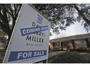 FILE- In this Feb. 20, 2019, file photo a coming soon for sale sign sits in front of a home in the Dallas suburb of Richardson, Texas. On Tuesday, March 26, the Standard & Poor's/Case-Shiller 20-city home price index for January is released.
