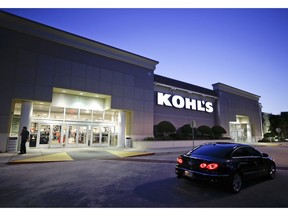 FILE - In this Aug. 22, 2017, file photo, a car drives by the entrance of a Kohl's department store in Orlando, Fla. Kohl's Corp. reports financial results Tuesday, March 5, 2019.