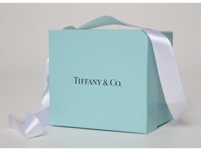 FILE - In this May 22, 2017, file photo, a gift box from Tiffany & Co. is arranged for a photo in Surfside, Fla. Tiffany & Co. reports financial results on Friday, March 22, 2019.