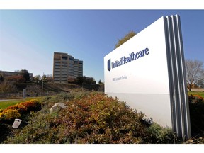 FILE - This Oct. 16, 2012, file photo, shows a portion of the UnitedHealth Group Inc.'s campus in Minnetonka, Minn. The nation's biggest health insurer is expanding a program that passes rebates from drugmakers directly to the people that use their medications. UnitedHealthcare said Tuesday, March 12, 2019, that next year, all of its new, employer-sponsored healthcare plans must give point-of-sale discounts to consumers when they pick up medications.