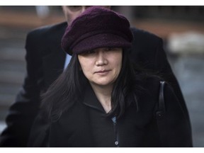 FILE- In this Jan. 29, 2019, file photo, Huawei chief financial officer Meng Wanzhou leaves her home to attend a court appearance in Vancouver, British Columbia. Canada said Friday, March 1, 2019, it will allow the U.S. extradition case against Wanzhou to proceed. She is due in court on March 6, at which time a date for her extradition hearing will be set. Meng is wanted in the U.S. on fraud charges that she misled banks about the company's business dealings in Iran.