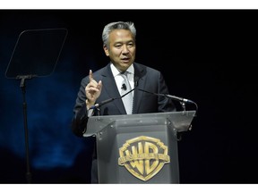 FILE - This April 21, 2015 file photo shows Kevin Tsujihara, chairman and CEO of Warner Bros., during the Warner Bros. presentation at CinemaCon 2015 in Las Vegas. Tsujihara is stepping down after claims that he promised acting roles in exchange for sex.  As Warner Bros. chairman and chief executive officer at one of Hollywood's most powerful and prestigious studios, Tsujihara is one of the highest ranking executives to be felled by sexual misconduct allegations.