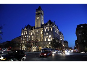 FILE - This Jan. 30, 2018, file photo shows the Trump International Hotel in Washington. A federal appeals court is set to hear arguments in a lawsuit that claims President Donald Trump is violating the Constitution by accepting profits from foreign and domestic officials through his hotel in Washington.