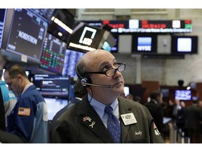 FILE- In this Feb. 22, 2019, file photo trader Andrew Silverman works on the floor of the New York Stock Exchange. The U.S. stock market opens at 9:30 a.m. EST on Thursday, March 7.