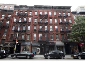 FILE - This Aug. 31, 2018 file photo shows Kushner family real estate firm-owned buildings 333, center, and 335 East 9th Street in the East Village neighborhood of New York. On Tuesday, March 19, 2019, a New York City councilman accused the company of putting tenants in danger by allowing several of its building to avoid safety inspections.