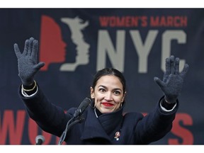 FILE - In this Jan. 19, 2019, file photo, U.S. Rep. Alexandria Ocasio-Cortez, D-New York, waves to the crowd after speaking at Women's Unity Rally organized by Women's March NYC at Foley Square in Lower Manhattan in New York. Most voters in New York think it was bad for the state when Amazon dropped plans to put a second headquarters in Queens and many think U.S. Rep. Alexandria Ocasio-Cortez bears blame for the deal falling through, according to a new poll released Monday.