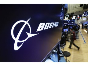 The Boeing logo appears above a trading post on the floor of the New York Stock Exchange before the opening bell, Monday, March 11, 2019. Boeing shares were predicted to fall at the open on Wall Street after the crash Sunday of a 737 Max 8 plane in Ethiopia that killed all 157 people aboard.