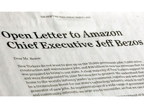 This photo shows a portion of an open letter published in the Friday, March 1, 2019 edition of The New York Times, signed by a group of business leaders, elected officials and others, urging Amazon CEO Jeff Bezos to reconsider the decision to abandon building a headquarters in New York City. The deal would have had Seattle-based Amazon redevelop a site in the Long Island City section of the Queens borough of New York, for one of two new headquarters. The company expected to base 25,000 jobs there.
