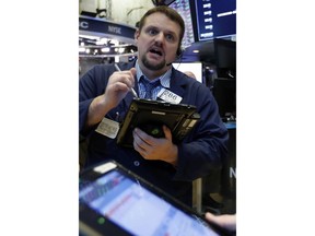 Trader Michael Milano works on the floor of the New York Stock Exchange, Thursday, March 7, 2019. U.S. stocks moved lower in morning trading, led by banks and technology companies, putting the market on track for its first losing week since January.