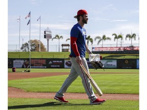 Philadelphia Phillies' Bryce Harper walks to the batting cages during baseball workouts Sunday, March 3, 2019, at Spectrum Field in Clearwater, Fla.